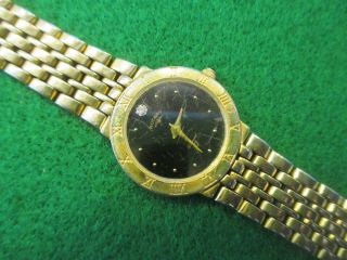 Rotary Ladies Dress Watch.  Black Face With Diamond & Stamped Gold Plated On Back
