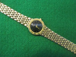 ROTARY Ladies Dress Watch.  Black Face With Diamond & Stamped Gold Plated On Back 2