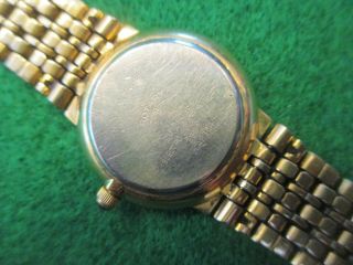 ROTARY Ladies Dress Watch.  Black Face With Diamond & Stamped Gold Plated On Back 5