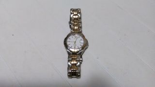Men ' s Seiko Quartz Watch with Time and Date.  Silver with Gold.  2 - tone 8f32 - 0199 3