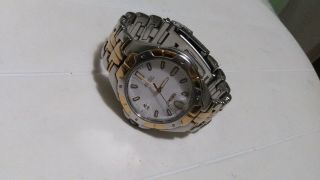 Men ' s Seiko Quartz Watch with Time and Date.  Silver with Gold.  2 - tone 8f32 - 0199 4