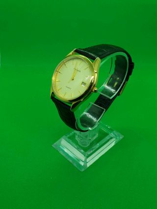 mens accurist gold tone dress wach with date display window, .  bm. 3