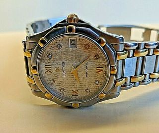 Concord Swiss made men ' s Saratoga watch with 18k gold and diamonds 11