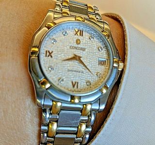 Concord Swiss made men ' s Saratoga watch with 18k gold and diamonds 5