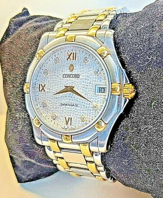 Concord Swiss made men ' s Saratoga watch with 18k gold and diamonds 6