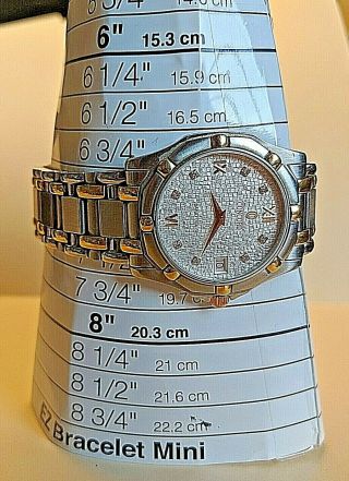 Concord Swiss made men ' s Saratoga watch with 18k gold and diamonds 8