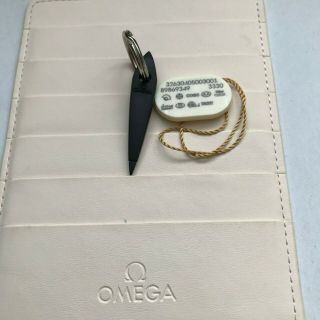 Omega Leather Guarantee Card Hanging Tag And Omega Date Set Keyring
