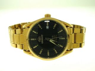 Orient 21 Jewel Gold Tone Black Face Stainless Wristwatch