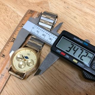 Vintage Timex Mens Gold Tone Moon Phase Quartz Watch Hours Day Date Battery 5