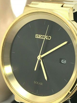 Seiko Solar Black Dial Date Gold Tone Stainless Steel Dress Men 