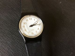 Swatch Watch With White Face With Silver Numbers & Slim Black Plastic Strap