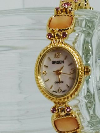 Ladies Gruen Watch Goldtone With Faux Gemstones & Mother Of Pearl Face