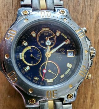 Bulova 98g41 6 Hand Chronograph Two Tone Ss Braclet With Calander Glowing Watch.