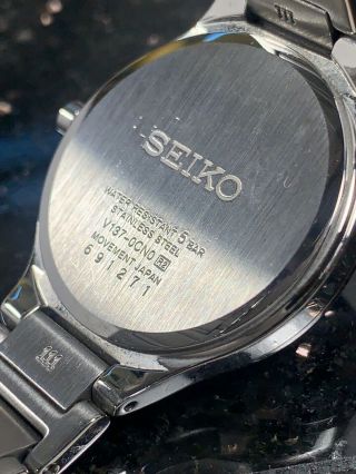 Seiko Solar Women ' s Silver Tone Stainless Steel Black Dial Diamond Date Watch WR 5