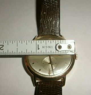 Vintage Doxa Swiss 14k gold men`s watch anti magnetic runs 12