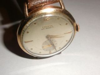 Vintage Doxa Swiss 14k gold men`s watch anti magnetic runs 4