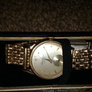mens 1955 9ct gold J.  W Benson wrist watch,  in. 12