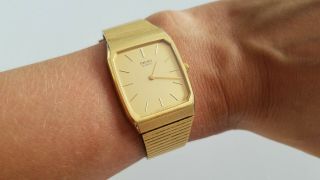 Vintage Seiko Men ' s Analog Bracelet Watch Quartz Gold Tone Stainless Steel 7