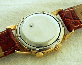 1950 ' s GIRARD PERREGAUX ALARM GOLDEN TEXTURED DIAL 34.  3MM GOLD PLATED CASE 6