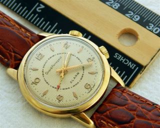 1950 ' s GIRARD PERREGAUX ALARM GOLDEN TEXTURED DIAL 34.  3MM GOLD PLATED CASE 9