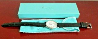 Tiffany & Co Stainless Steel White Dial Unisex Swiss Made Date Face Watch.