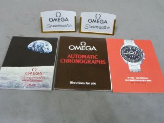 3 Omega Booklets,  And 3 Store Displays.