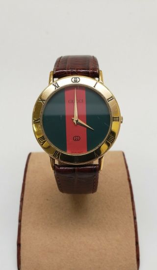 Gucci 3000m Gold Plated Green & Red Striped Dial 6j Watch