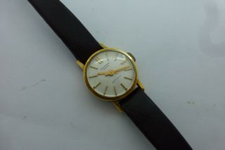 Vintage Universal Geneva Ladies Automatic 18k Gold Watch.