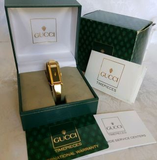 Gucci Ladies Wrist Bangle Watch 1500 Black Dial Gold Tone Quartz W/box & Card