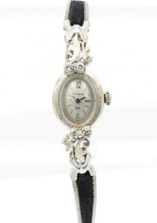 Bulova 14k White Gold And Diamond.  34 Ctw Vintage Ladies Oval Wristwatch 6737