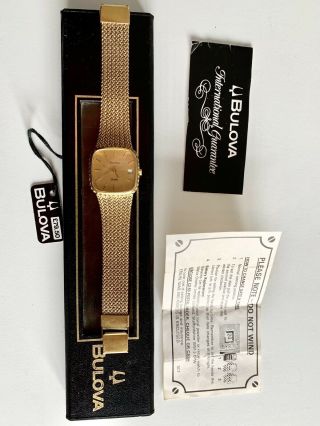 Vintage 70’s Bulova Quartz Gold Watch And Papers