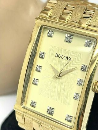 Bulova Mens Diamond Dial Gold Tone Stainless Steel Wide Band Quartz Watch 97f52