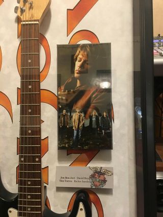 Bon Jovi signed guitar,  autographed,  certificate of authenticity,  and framed. 2