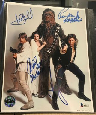 Star Wars Cast Signed 8x10 Harrison Ford Carrie Fisher Mark Hamill Peter Mayhew