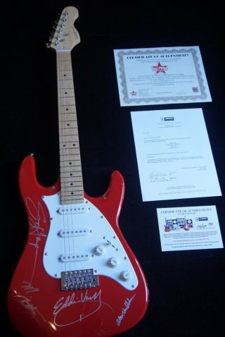 Van Halen Autographed Guitar,  including Sammy Haggar.  Red,  electric guitar. 2