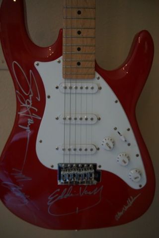 Van Halen Autographed Guitar,  including Sammy Haggar.  Red,  electric guitar. 3