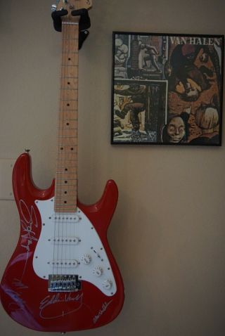 Van Halen Autographed Guitar,  including Sammy Haggar.  Red,  electric guitar. 4