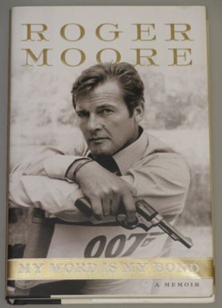 Sir Roger Moore 007 James Bond Hand Signed Book,  100 Authenticated