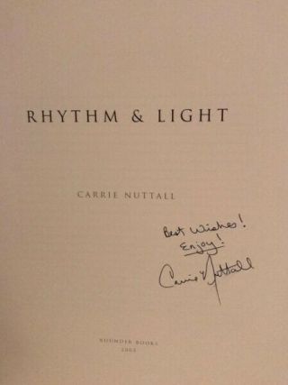 Neil Peart of RUSH & Carrie Nuttall signed books - 