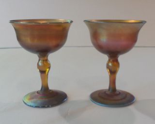 Pair L.  C.  Tiffany Favrile Gold Iridescent Art Glass Wine Goblets