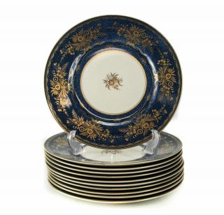 11 Minton Porcelain Dinner Plates In M19 Pattern,  Circa 1950.  Dark Blue Ground