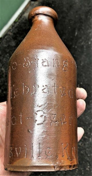 Small Blob Top Stoneware Bottle: GEO.  STANG CELEBRATED ROOT BEER LOUISVILLE,  KY. 10