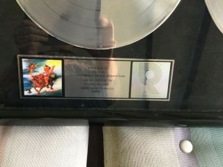 Stone Temple Pilots.  RIAA Award for for sales of 3 million cd,  case & lp 2