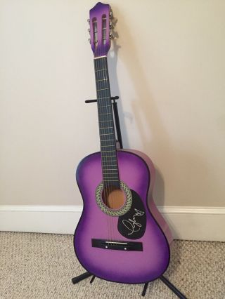 Taylor Swift Autographed Guitar And Portrait Package.