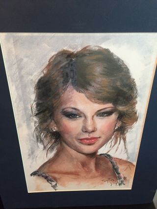 Taylor Swift Autographed Guitar and Portrait Package. 2