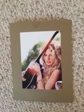 Taylor Swift Autographed Guitar and Portrait Package. 4