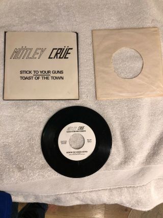 Motley Crue Stick To Your Guns / Toast Of The Town Leathur Records 45 The Dirt