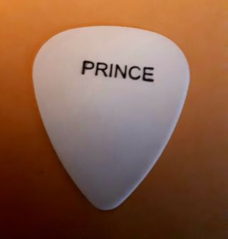Prince Guitar Pick.  Plus Prince And Sheila E Concert Ticket Stub November 1984