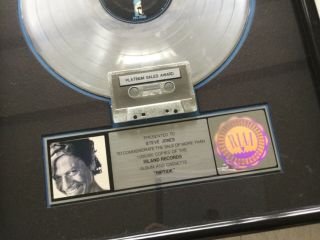 Robert Palmer “riptide”.  RIAA award for 1 million sales of lp,  & cassette 2