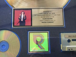 Melissa Etheridge.  RIAA Award for for sales of 500,  000 lp,  cassette & cd 2